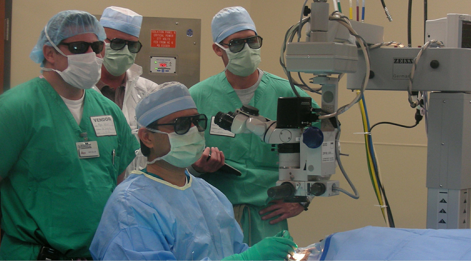 Dr. Gulani Performing Surgery With Other Doctors Watching