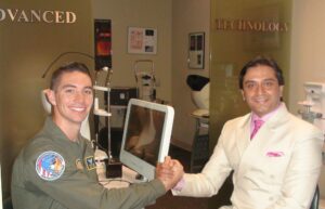 Excited pilot and patient celebrating clear vision after LaZrPlastique®, the no-cut, no-blade LASIK alternative.