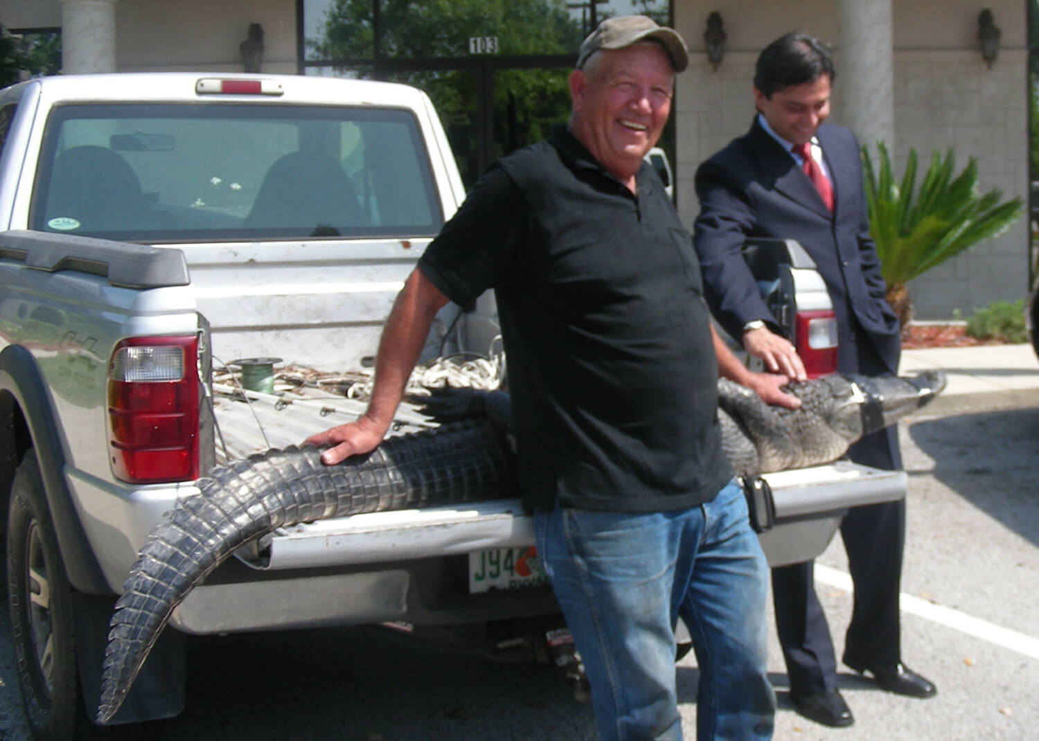 Dr. Gulani With a Patient and an Alligator