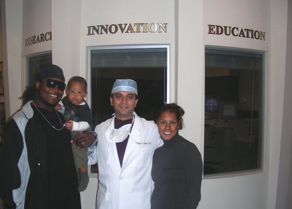 Professional Football LineBacker, Mike Peterson,  Wife and son Michael Jr. With Dr. Gulani